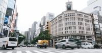 Foreign travelers sitting on sidewalks of Tokyo’s Ginza are Japan’s latest tourism culture clash