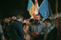 Demonstrators in Tbilisi protested the lawsuit to ban opposition parties.