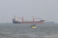 Iran says a ship sank after striking a mine in Strait of Hormuz