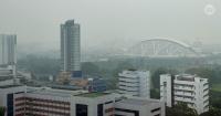 Haze watch Oct 14: Lowered visibility, burning smell as PM2.5 hits high band in eastern, western and southern Singapore