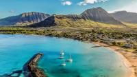 Hawaii's breathtaking coastal gem offers pristine ocean views, dolphin watching, and snorkeling tours