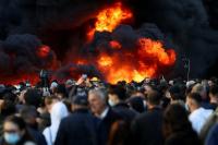 Banks, buildings burn as Albania's capital Tirana erupts into student violence