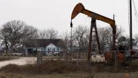 Oil prices fall as investors weigh supply outlook, Middle East tensions