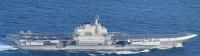 Japan defense chief vows to boost monitoring after sailing of China carrier