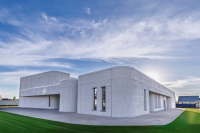 Three AMTG construction 3D printers produce walls for Mella shopping center