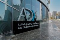 Banks help stem ADX decline as DFM falls more than 1%