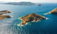 Private island in Greece - described as a 'blank canvas' with three beautiful beaches - goes on sale for £3.8m