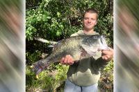 Minnesota teen reels in largemouth bass that is just shy of state record