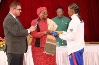 President hands national flag to 12 athletes headed for Dakar Youth Olympics