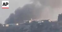 Video shows smoke rising near a palace used by Yemen's government