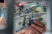 Philippine peso sinks past P63 per dollar for first time
