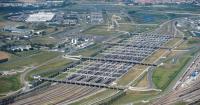19 hurt after bus hits train near Channel Tunnel in France