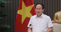Vietnam halves public schools, moves 28,000 managers into teaching