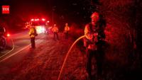California wildfires spread amid strong winds; over 150,000 customers without power