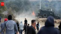 Israeli settlers attack Palestinian villages, torch cars and trees during olive harvest