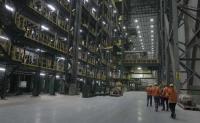 U.S. factory output rises as energy costs slow manufacturing