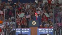 Secret Service rushes to Trump's side as rowdy protesters interrupt Georgia midterm rally