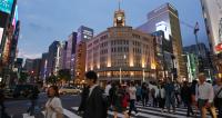 Tourists Sitting on Ginza Sidewalks Stir Debate in Tokyo