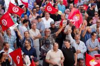 Tunisians stage biggest protest in years against President Saied