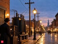 In 1886, William Stanley lit a Massachusetts Main Street with a new AC system; his transformer proved electricity could travel farther and still be used safely