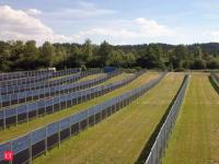 In 2024, a New York dairy farmer kept farming alongside a 6.5-megawatt solar project; wider panel spacing allowed tractors to pass and hay to grow
