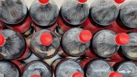 Coca-Cola pledged a quarter of its drinks in refillables by 2030, then scrubbed it from its site