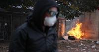 Fires break out as protesters rally across France, joining students