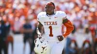 Texas star Colin Simmons suffers apparent leg injury vs. Florida