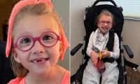 Wheelchair-bound 'courageous' 7-year-old who was shot in the face by Oregon school shooting gunman fought for her life as high school students she 'inspired' rallied around her