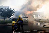 California Wildfires In Photos: Firefighters Battle Norte Fire As Flames Threaten Homes