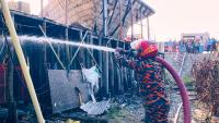 Children among 10 dead after huge fire breaks out at popular tourist beach as people left trapped inside burning huts