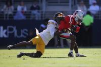 Trinidad Chambliss records 4 TDs as No. 9 Ole Miss blasts No. 13 Missouri