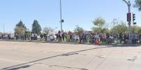 Demonstration encouraging voting lines busy intersection in Sioux Falls
