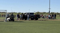 Two killed, including child, after vehicle ploughs into youth football match in Kansas