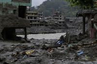 Nepali man learning from Japan to preserve flood-hit sites for posterity