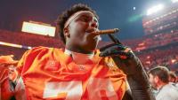 Cigars, field storms and more lead scenes from a wild, historic college football day