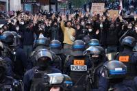 Scores detained in Paris as protesters clash with police during nationwide demonstrations in France 