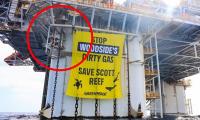 Two protesters in custody after Greenpeace stunt on gas rig off the Australian coast