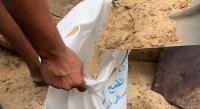 Gaza families turn flour sacks into flood barriers ahead of winter