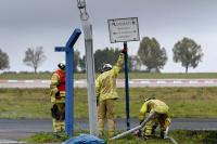 German authorities investigate a hole cut into a fence at Leipzig airport