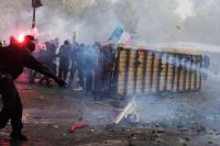 French police arrest 1,800 protesters after violent clashes and looting