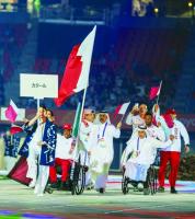 Abdulqader carries Qatar flag at Asian Para Games Opening Ceremony