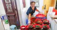 Hanoi herbal-chicken noodle shop in narrow Old Quarter alley is always packed