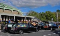 Funeral held for family of four who died in 'arson attack' on their home in Ireland that left two other children remain fighting for their lives