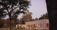 McLean Quinlan completes courtyard house in Surrey woodland
