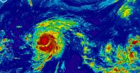Champi may regain super typhoon status as outer bands brush Guam