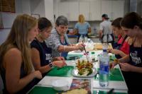 Barcelona ‘grandmas’ dish out cooking wisdom. And find nourishment themselves