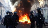 Stock markets and bonds sell off across Europe as investors alarmed by spiralling unrest in France