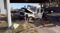 Sewage truck falls off bridge after collision with Tesla in Astana