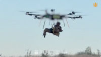 Ukrainian Forces Use Heavy Aerial Drone to Rescue Wounded Soldier From Mined Battlefield